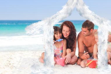 Composite image of portrait of a family at the beach clipart