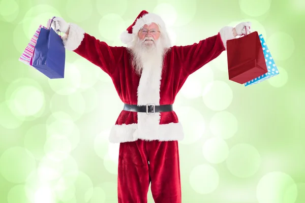 Babbo Natale tiene alcune borse per Natale — Foto Stock