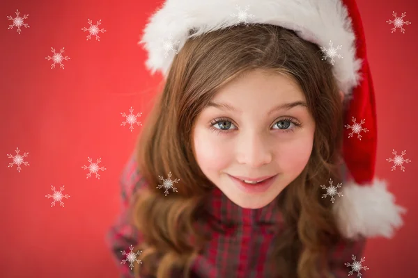 Glad liten flicka i santa hatt — Stockfoto