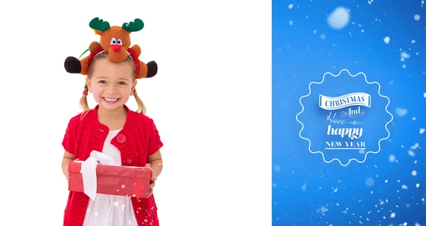 Cute little girl wearing rudolph headband — Stock Photo, Image