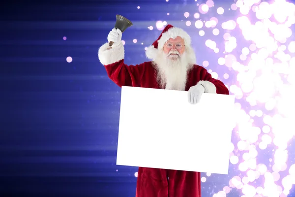 Papai Noel segura sinal e toca sua campainha — Fotografia de Stock