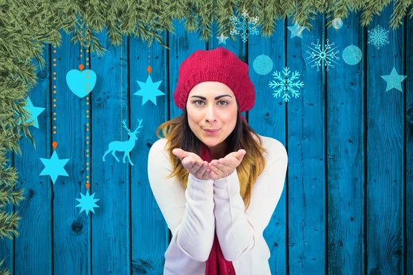 Brunette in winter clothes with hands out — Stock Photo, Image