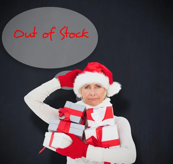 Festive woman holding gifts — Stock Photo, Image