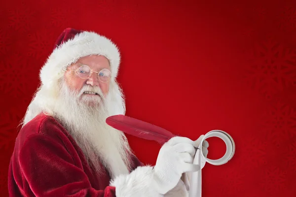 Father Christmas writes a list — Stock Photo, Image
