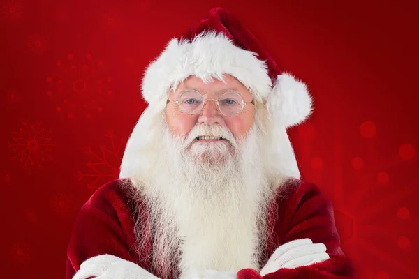 Santa gülümsüyor katlanmış silah ile — Stok fotoğraf