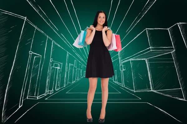 Woman walking with shopping bags — Stock Photo, Image