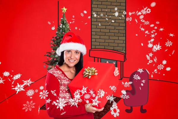 Young brunette with christmas present — Stockfoto