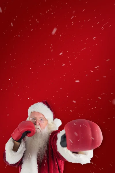 Santa Claus punches with his right — Stock Photo, Image