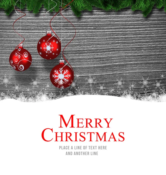 Frohe Weihnachten gegen Christbaumkugeln — Stockfoto
