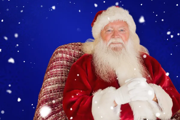Santa Claus sitting on the armchair — Stock Photo, Image