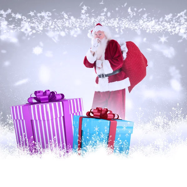 Santa asking for quiet with bag — Stock Photo, Image