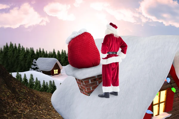 Santa sul tetto cottage — Foto Stock