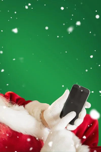 Santa χρησιμοποιώντας smartphone — Φωτογραφία Αρχείου