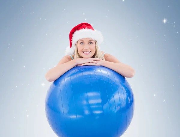 Fit blonde leaning on exercise ball — Stock Photo, Image