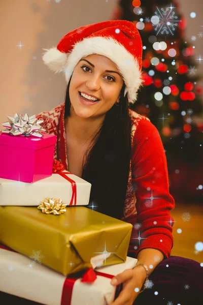 Festive brunette smiling at camera — Stock Photo, Image