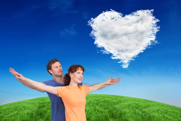 Happy couple looking upwards — Stock Photo, Image