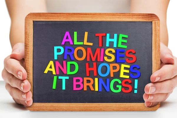 Composite image of females hands showing black board — Stock Photo, Image