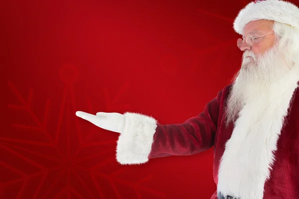 Santa shows something to camera — Stock Photo, Image