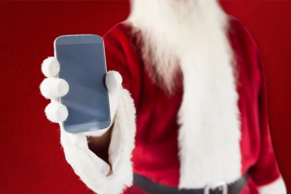 Santa Claus visar smartphone — Stockfoto