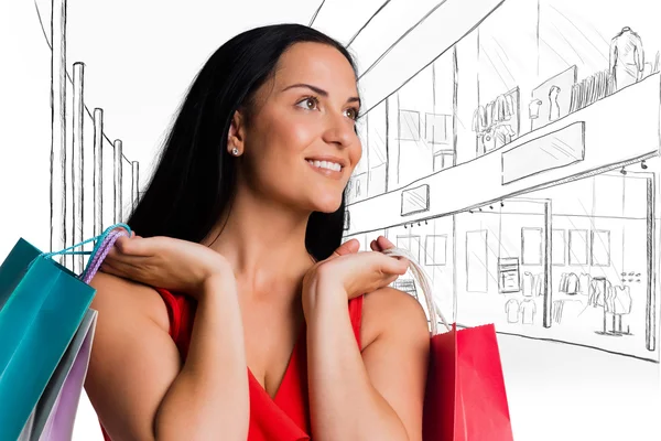 Alışveriş torbaları ile duran kadın — Stok fotoğraf