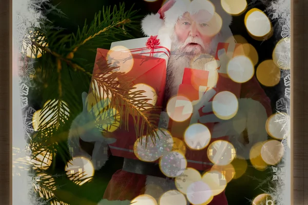 Babbo Natale porta alcuni regali — Foto Stock