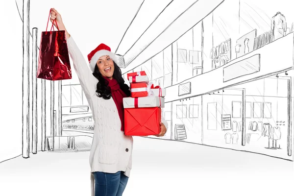 Smiling woman with christmas presents — Stock Photo, Image