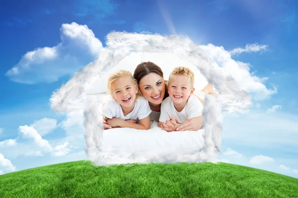 Laughing children playing with their mother — Stock Photo, Image