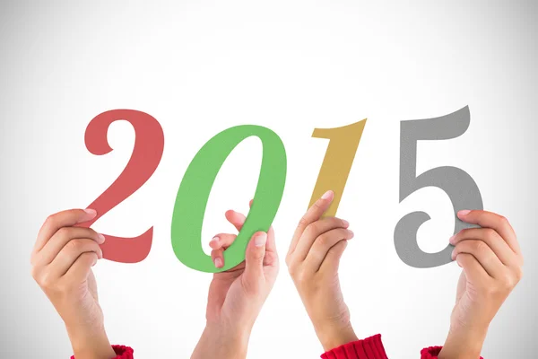 Composite image of hands holding poster — Stock Photo, Image