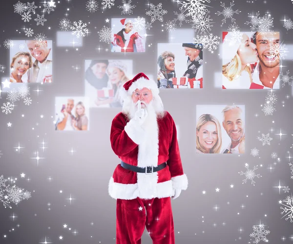 Papai Noel pedindo silêncio para câmera — Fotografia de Stock