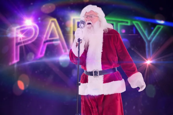 Santa singt wie ein Superstar — Stockfoto