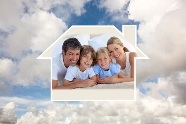 Merry family having fun in bedroom — Stock Photo, Image