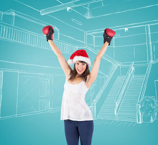 Brunette cheering with boxing gloves — Stock Photo, Image