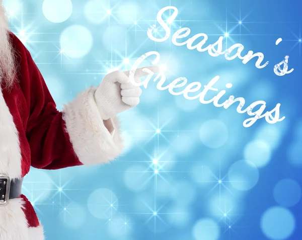 Santa Claus points at something — Stock Photo, Image