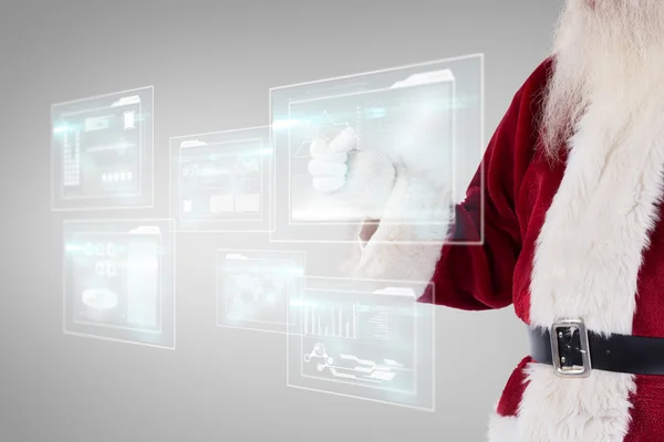 Santa Claus poäng på något — Stockfoto