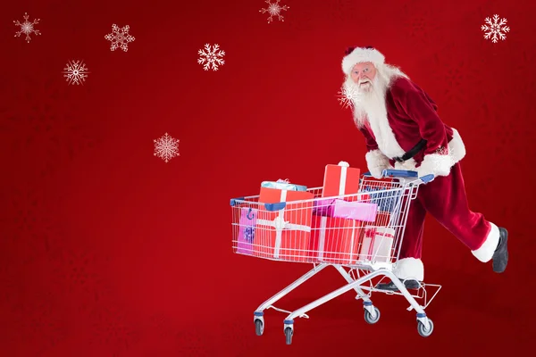 Paseos en Santa en el carrito de compras — Foto de Stock