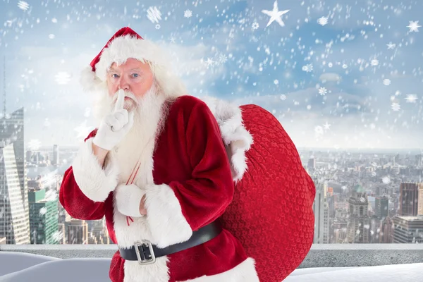 Santa, žádá o klid s taškou — Stock fotografie