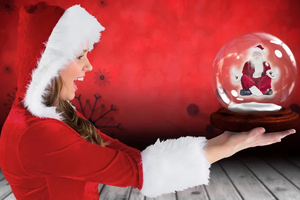 Seksi Noel Baba kız kar küresi holding — Stok fotoğraf