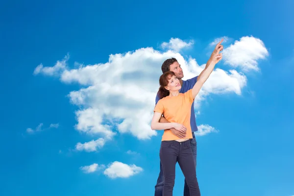 Couple pointing upwards — Stock Photo, Image