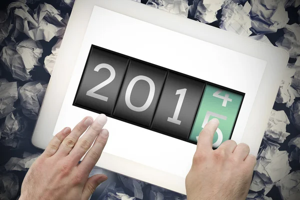 2014 förändras till 2015 mot tablet — Stockfoto