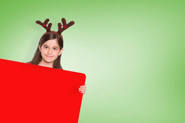 Festive little girl showing card — Stock Photo, Image