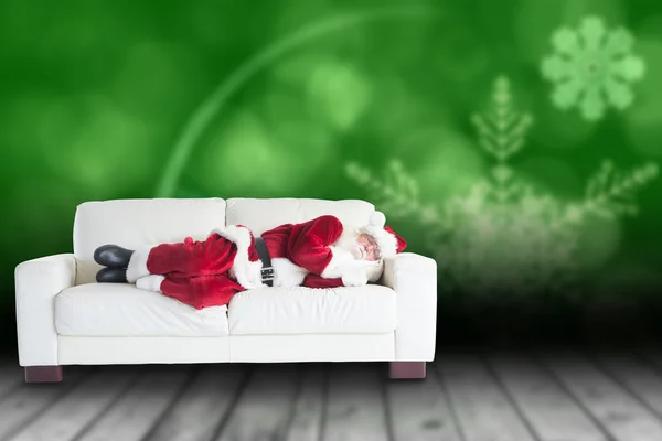 Father Christmas sleeps on couch — Stock Photo, Image