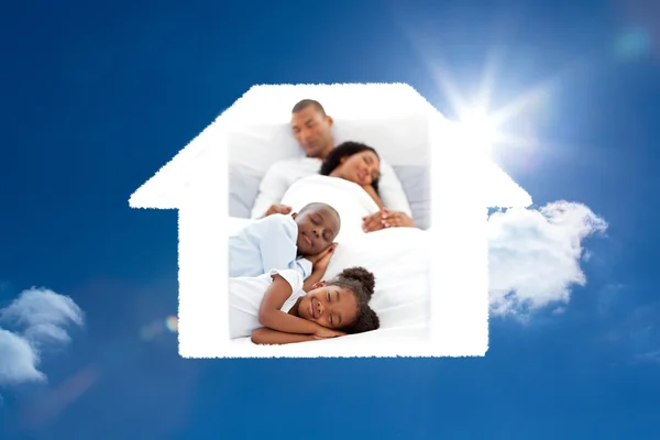 Composite image of jolly family sleeping — Stock Photo, Image