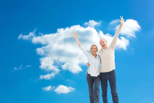 Happy mature couple cheering — Stock Photo, Image