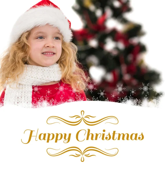 Bambina festiva in cappello di Babbo Natale — Foto Stock