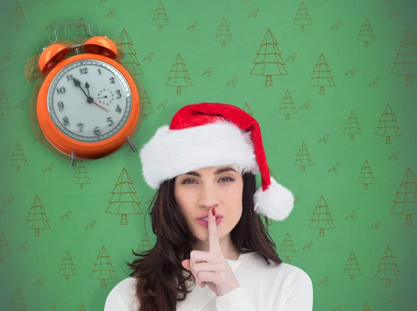 Festive brunette keeping secret — Stock Photo, Image