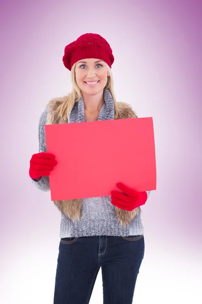 Blonde holding red sign — Stock Photo, Image