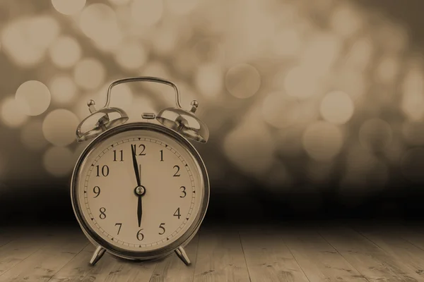 Composite image of alarm clock counting down to twelve — Stock Photo, Image