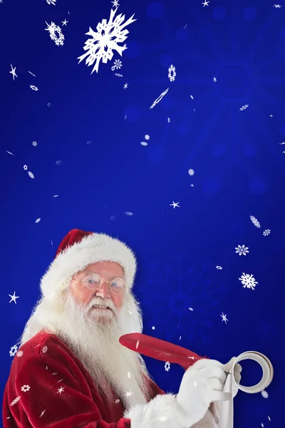 Father Christmas writes list — Stock Photo, Image