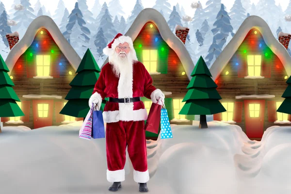 Santa bär några jul väskor — Stockfoto