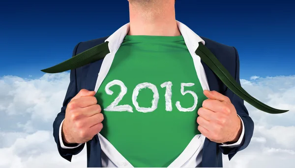 Businessman opening shirt in superhero — Stock Photo, Image